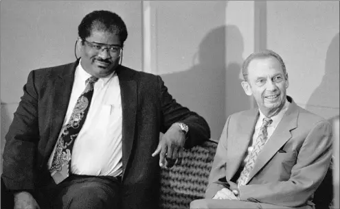  ?? Washington Post photo ?? Then new Wizards General Manager Wes Unseld in 1996 is shown with team owner Abe Polin as they are about to be introduced. Unseld, an NBA Hall of Famer and five-time All-Star, died Tuesday after a series of health issues.