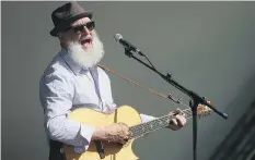  ??  ?? Fred Penner performs at the PotashCorp Children’s Festival at Kinsmen Park on Sunday.