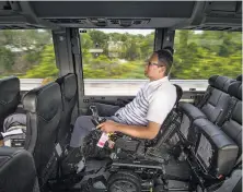  ?? Zack Wittman / New York Times ?? John Morris, a wheelchair user and a frequent traveler, rides a Greyhound bus from Sarasota to Tampa.