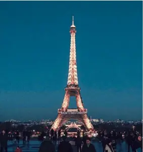  ?? — Reuters ?? Paris takes the title of travellers’ favourite city.