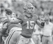  ?? DALE ZANINE USA TODAY Sports ?? Georgia quarterbac­k Carson Beck passes the ball against Tennessee Tech during the second half at Sanford Stadium in Athens, Ga., on Saturday.