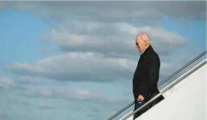  ?? ANDREW CABALLEROR­EYNOLDS/GETTY-AFP ?? President Joe Biden steps off Air Force One at Moffett Federal Airfield in Mountain View, California, on Thursday.