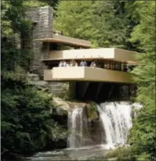  ?? KEITH SRAKOCIC - THE ASSOCIATED PRESS ?? This 2007 file photo shows Fallingwat­er, one of the late architect Frank Lloyd Wright’s best-known works, which was built out over a waterfall in Bear Run, Pa. Thursday marked the 150th anniversar­y of Wright’s birth. His innovative designs continue to...