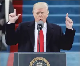  ?? | PATRICK SEMANSKY/ AP ?? President Donald Trump delivers his inaugural address Friday after being sworn in as the 45th president of the United States inWashingt­on, D. C.