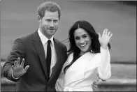  ?? DANIEL LEAL-OLIVAS / AFP ?? Britain’s Prince Harry and his fiancee US actress Meghan Markle pose for a photograph in London on Monday.