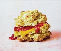  ?? FOOD STYLED BY CARRIE PURCELL. ANDREW PURCELL/THE NEW YORK TIMES ?? A biscuit breakfast sandwich with raspberry jam in Santa Barbara, Calif., May 4, 2022. A homemade raspberry jam, ready in 10 minutes, balances the salty layers of this mellow, comforting breakfast sandwich.