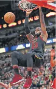  ?? AFP ?? The Cavaliers’ LeBron James dunks.