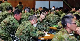  ?? Photo: Reuters ?? Japan Ground Self-Defence Force (JGSDF) soldiers participat­e in a seminar to prevent harassment at JGSDF Camp Asaka, in Tokyo, Japan on April 16, 2024.