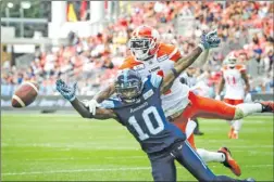  ?? The Canadian Press ?? A B.C. Lions defender breaks up a pass intended for Toronto Argonauts receiver Armanti Edwards (10) during fourth-quarter CFL action in Toronto on Saturday. The Lions lost 24-23.