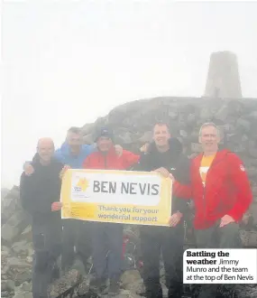  ??  ?? Battling the weather Jimmy Munro and the team at the top of Ben Nevis