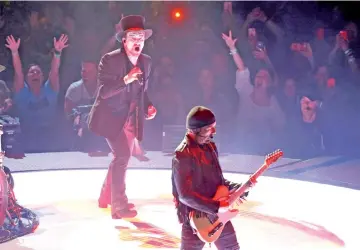  ?? — Reuters file photo ?? Bono (Left) and The Edge of U2 perform during the band’s “Experience + Innocence” tour at The Forum in Inglewood, California, US, May 16, 2018.