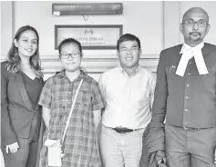  ??  ?? Lew Yee Hong (second right) with his daughter and their lawyers, Larissa Ann Louis and Annou Xavier in High Court Kuala Lumpur yesterday.