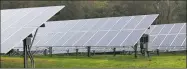  ?? Hearst Connecticu­t Media file photo ?? A solar array at White Flower Farm in Litchfield. In Torrington, US Solar, a Minnesota-based company, is proposing a solar project on the city’s landfill property.