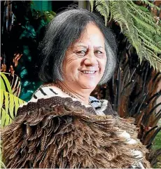  ?? MARK TAYLOR/STUFF ?? Maata McManus received a Commonweal­th Points of Light award from the UK High Commission­er in New Zealand. So far she has made 29 korowai, pictured above, using feathers from roosters, pheasants and pu¯ keko. She has even been to the Chatham Islands for weka feathers, as the bird is not protected there.