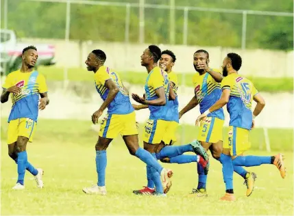  ?? GLADSTONE TAYLOR ?? Shemar Nairne (third left) celebrates with Harbour View teammates after scoring against UWI FC in their Red Stripe Premier League match at the UWI Mona Bowl in St Andrew on January 9.