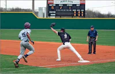  ?? Tim Godbee ?? Former Calhoun first baseman Andon Lewis, shown here stretching for a throw against Hiram in 2022, is currently in the JUCO World Series as first baseman for St. John’s River State College.