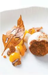  ?? Courtesy of Cristal Room by Anne-Sophie Pic ?? Cristal Room’s chestnut baba soaked in whisky, vanilla chantilly and mandarin confit