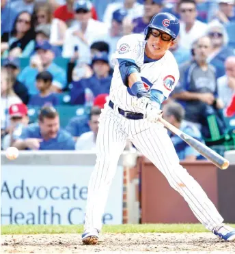  ??  ?? Pinch hitter Munenori Kawasaki strikes out to make the final out of the eighth inning. | JON DURR/ GETTY IMAGES