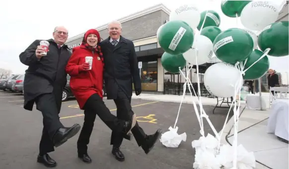  ?? VINCE TALOTTA/TORONTO STAR ?? Councillor­s Dave Shiner and Maria Augimeri with Build Toronto CEO Bill Bryck at the official opening of the mall, billed as a step forward in transformi­ng the city’s suburban landscape.