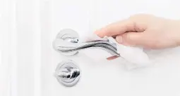  ?? DREAMSTIME ?? Door handles and water fixtures often get missed during regular cleaning.