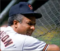  ?? JONATHAN DANIEL/GETTY IMAGES/TNS ?? Manager Frank Robinson (the first black manager of MLB) of the Baltimore Orioles looks on during batting practice in the 1989 season.