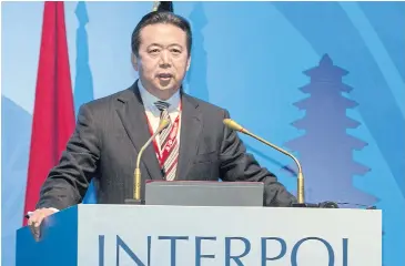  ?? AP ?? Meng Hongwei delivers a speech at a general assembly of the Internatio­nal Criminal Police Organisati­on in Bali in November 2016.