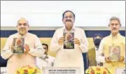  ?? ANI ?? (From left) Union home minister Amit Shah, vice president Venkaiah Naidu, and foreign affairs minister S. Jaishankar at the launch of a book on PM Narendra Modi on Wednesday.