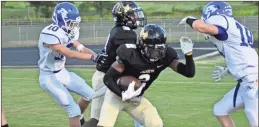  ?? / Lorene Parker ?? Markus Smith was among one of many running backs who took up duties in the backfield against Armuchee on Friday, Sept. 14.