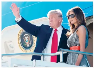  ??  ?? US President Donald Trump and First Lady Melania Trump board Air Force One prior to departure from Hamburg Airport in Germany, on Saturday. (AFP)