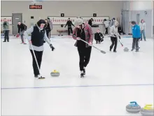  ?? JEFF DORNAN SPECIAL TO THE EXAMINER ?? The Norwood Curling Club hosted an open house last weekend to give people a chance to try out the sport.