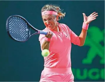  ?? AFP ?? ■ Victoria Azarenka powers a forehand to Karolina Pliskova during the Miami Open at Crandon Park Tennis Center in Key Biscayne on Tuesday. The Belarusian won 7-5, 6-3.