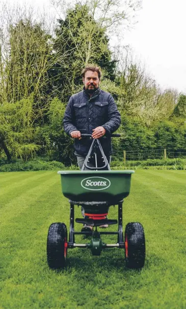  ??  ?? David Hedgesgowe­r feeding a lawn, main; aerate soil with a hollow-tine fork, far left; brown grass will recover, left; a rake is adequate for removing debris in small areas, right; tackle moss, inset right