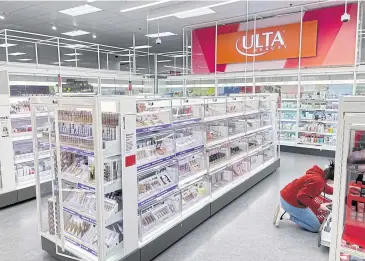  ?? REUTERS ?? Makeup and other beauty products are locked behind plexiglass in the Ulta Beauty section of a Target store in White Plains, New York.