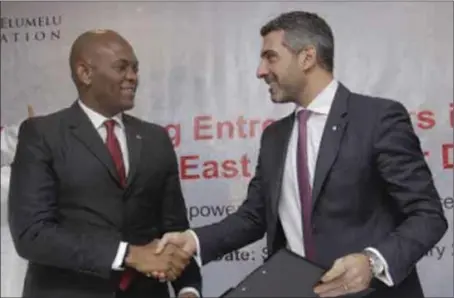  ??  ?? Elumelu and Youssef at the signing ceremony