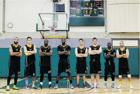  ?? RICK JONES ?? The Vancouver Balloholic­s, left to right: Clay Crellin, Demitri Harris, Kadeem Willis, Gabe Gibbs, Chad Warren, Graham Bath, Jonathan Thompson, Carlos Singer, pose after their season-opening 123-86 win over the Everett (Wash.) Evolution in November.