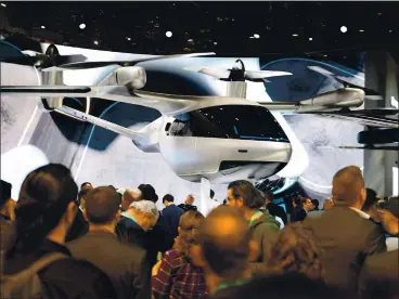  ?? ROBYN BECK — AGENCE FRANCE-PRESSE VIA GETTY IMAGES ?? The Hyundai S-A1 electric Urban Air Mobility concept was being worked on for Uber Elevate’s project. Air taxis, like autonomous cars, are unlikely to make a significan­t impact for several years.