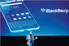  ?? JOSEP LAGO/GETTY IMAGES ?? TCL Communcati­on’s CEO Nicolas Zibell presents the new BlackBerry Key One at the Mobile World Congress centre in Barcelona on Saturday.