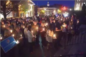  ?? PETE BANNAN - DIGITAL FIRST MEDIA ?? Over 300 people turned out for a candleligh­t vigil on the steps of the Historic Chester County Courthouse Thursday evening in remembranc­e of the 11 victims of the Tree of Life Synagogue shooting in Pittsburgh.