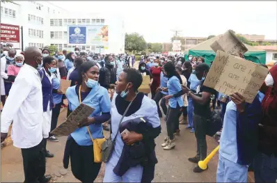  ??  ?? Nurses at Parirenyat­wa Group of Hospitals in Harare demonstrat­e against poor working conditions on Wednesday