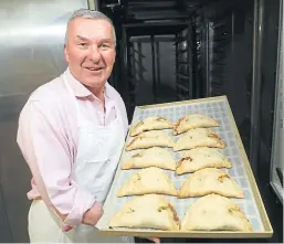  ?? Picture: Gareth Jennings. ?? Michael Saddler with a tray of bridies just out of the oven.