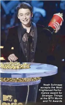  ??  ?? Noah Schnapp accepts the Most Frightened Performanc­e award for Stranger Things at the MTV Movie and TV Awards