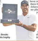  ??  ?? World beater: Brooks Koepka with his trophy