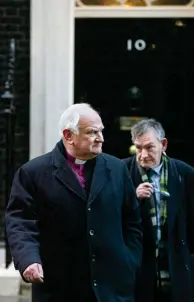  ?? ?? Pivotal negotiatio­ns: With Robin Eames at Downing Street in 2009