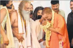  ?? HT FILE/DEEPAK GUPTA ?? Uttar Pradesh chief minister Yogi Adityanath with mahant Nritya Gopal Das in Ayodhya.