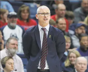  ?? Steven Senne / Associated Press ?? UConn coach Dan Hurley shouts from the bench during the second half against South Florida in March.