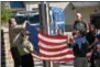  ?? SUBMITTED PHOTO ?? Rainbow Elementary School Boy Scouts began the Patriot Day ceremony and raised and lowered the flag to half staff on Monday.