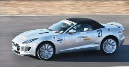  ?? PICTURE: THOMAS FALKINER ?? The Cannonball Run tested both driving and thinking talent by combining timed track sections with cryptic scavenger hunts. This is our man Jesse Adams setting a time in the Jaguar F-Type. The Jag team was pretty sharp on the track ... but not so much on the bits inbetween.