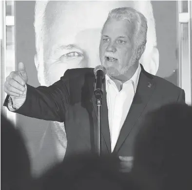  ?? JACQUES BOISSINOT / THE CANADIAN PRESS ?? Quebec Liberal Leader Philippe Couillard makes a pitch for votes in Saguenay, Que., on Sunday.