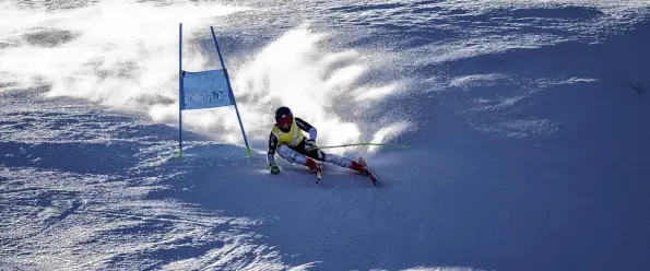  ?? PHOTO: SEAN BEALE/WINTER GAMES NZ ?? Easy for Feasey . . . New Zealand skier Willis Feasey wins the men’s super G on the opening day of the Winter Games at Coronet Peak.