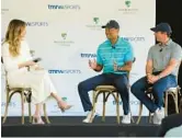  ?? WILFREDO LEE/AP ?? Tiger Woods and Rory McIlroy, right, talk to host Erin Andrews about the future home of their tech-infused golf league that will begin play next year.